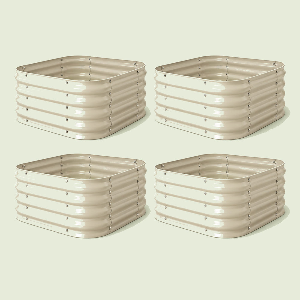 Four-Pack of Small Modular Metal Raised Beds, 14 Inches Tall on a soft green background