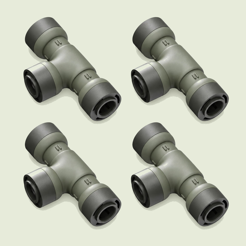 Tee Connector for Irrigation Lines on a soft green background