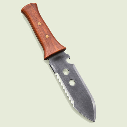 10-Function Hori Hori Garden Knife on a soft green background