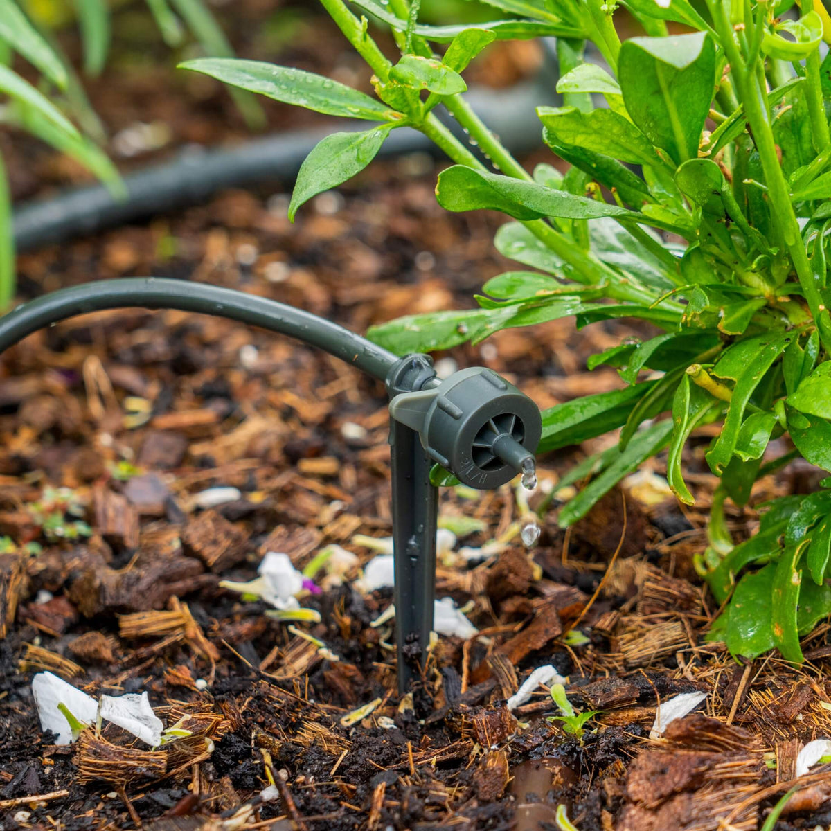 Product photo of drip nozzle and stake for irrigation