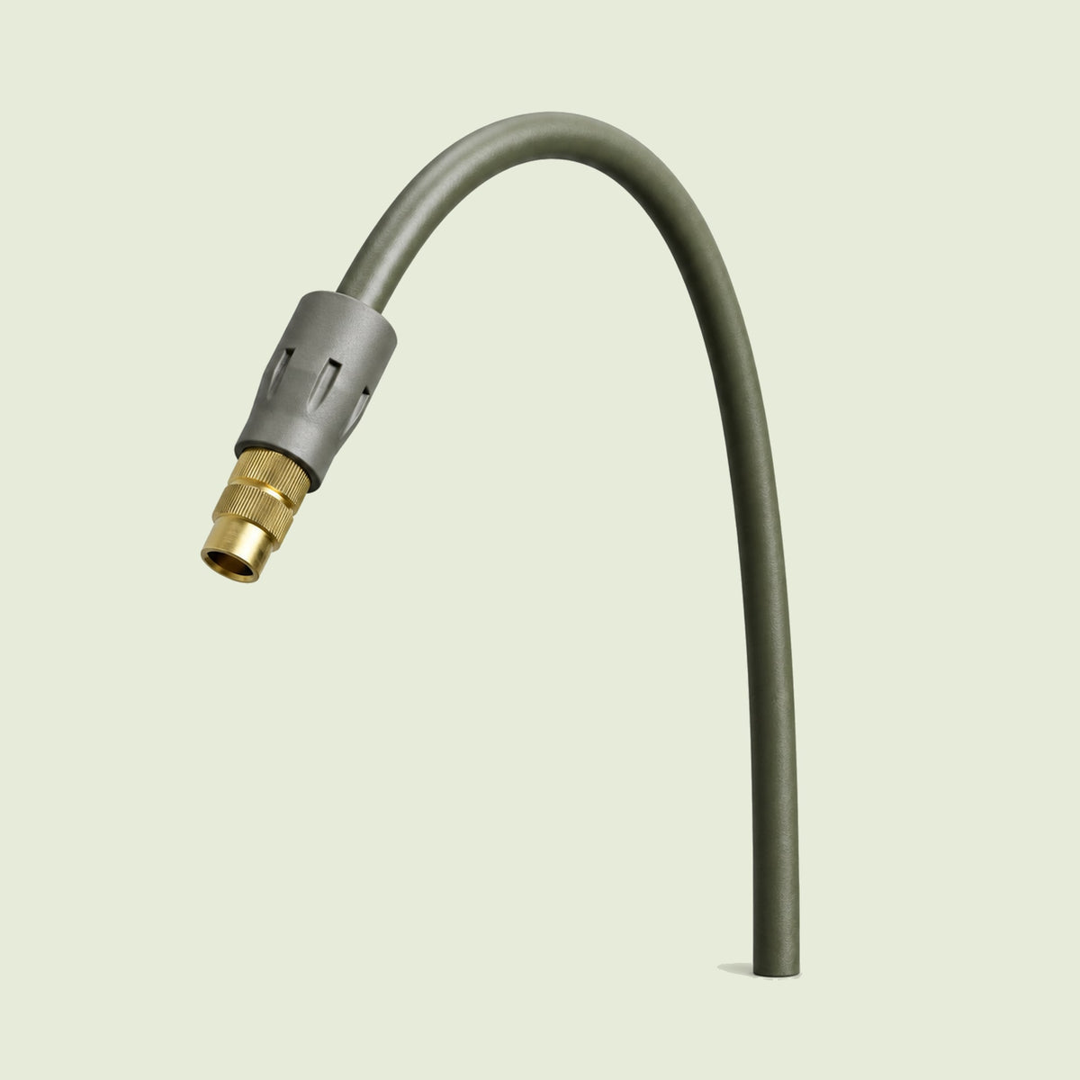 Adjustable Mist Nozzle for Irrigation on a soft green background