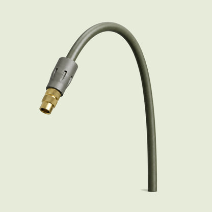 Adjustable Mist Nozzle for Irrigation on a soft green background