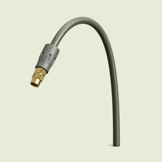 Adjustable Mist Nozzle for Irrigation on a soft green background