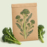 Kraft seed packet illustrated with Aspabroc Sprouting Broccoli, with fresh Aspabroc Sprouting Broccoli beside it