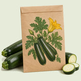Kraft seed packet illustrated with Black Beauty Zucchini, with fresh Black Beauty Zucchini beside it