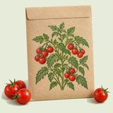Kraft seed packet illustrated with Cherry Falls Bush Cherry Tomato, with fresh Cherry Falls Bush Cherry Tomato beside it