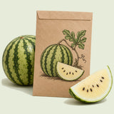 Kraft seed packet illustrated with Cream of Saskatchewan Watermelon, with fresh Cream of Saskatchewan Watermelon beside it