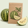 Kraft seed packet illustrated with Cream of Saskatchewan Watermelon, with fresh Cream of Saskatchewan Watermelon beside it