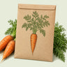 Kraft seed packet illustrated with Danvers 126 Carrot Heirloom, with fresh Danvers 126 Carrot Heirloom beside it