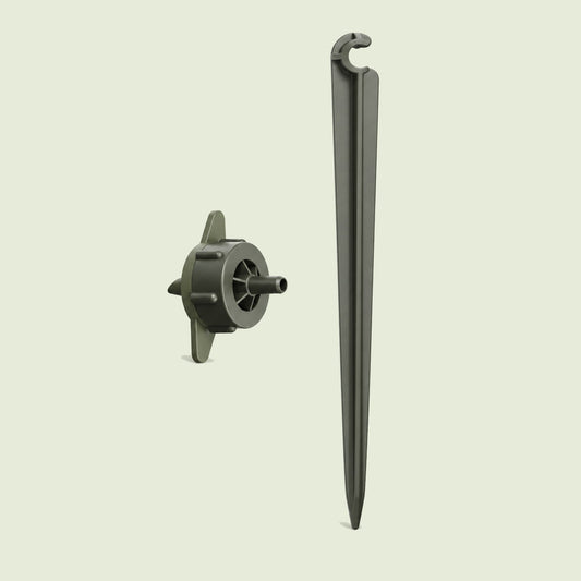 Drip Nozzle and Stake for Irrigation on a soft green background