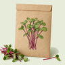 Kraft seed packet illustrated with Early Wonder Beet Microgreens, with fresh Early Wonder Beet Microgreens beside it