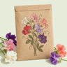 Kraft seed packet illustrated with Elegance Blend Sweet Pea, with fresh Elegance Blend Sweet Pea beside it