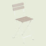 Folding Patio Stool on a soft green background