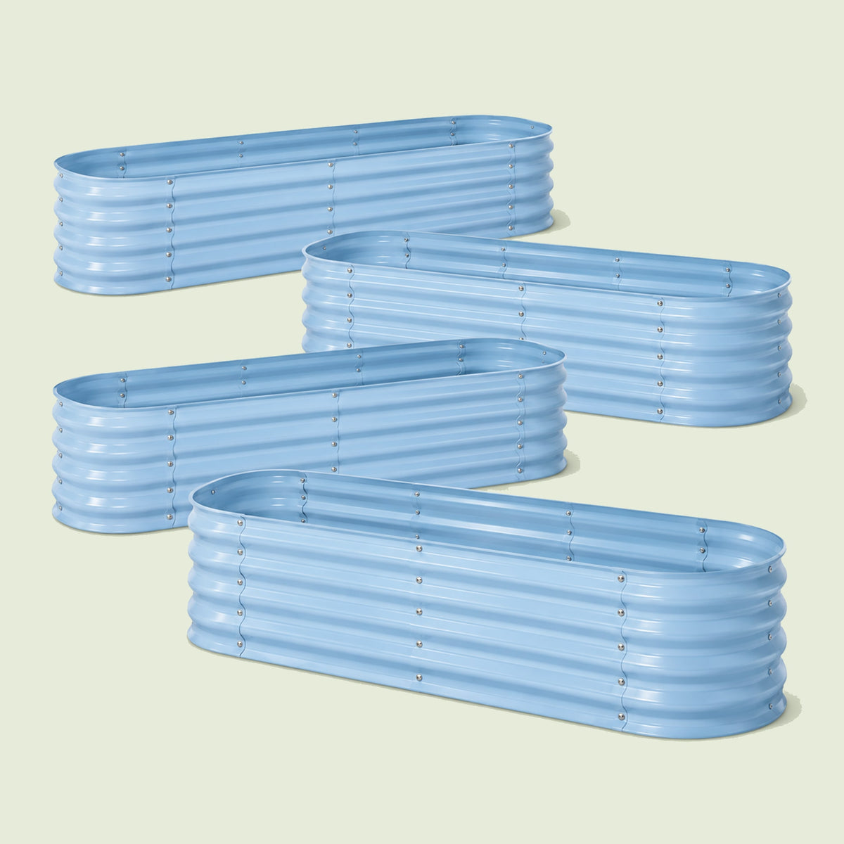 Four 17-Inch Modular Metal Raised Beds on a soft green background