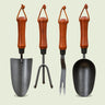 Four-Piece Garden Hand Tool Set on a soft green background