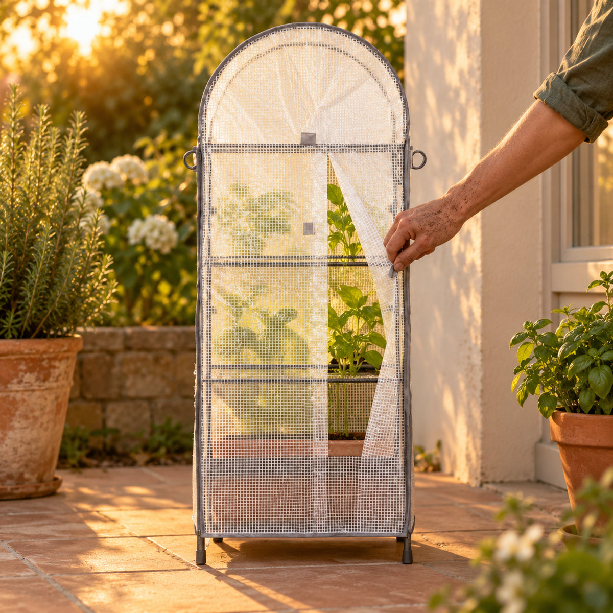 Frost Cover and Trellis for 21 x 24 Inch Planter in use in a home garden