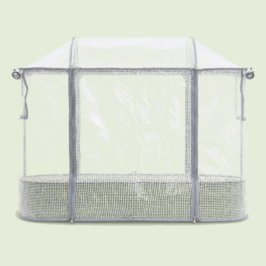 Frost Cover for Elevated Rolling Garden Bed on a soft green background