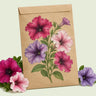 Kraft seed packet illustrated with Garden Party Blend Petunia, with fresh Garden Party Blend Petunia beside it