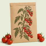 Kraft seed packet illustrated with Gardener's Delight Pole Cherry Tomato, with fresh Gardener's Delight Pole Cherry Tomato beside it