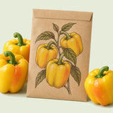 Kraft seed packet illustrated with Golden Cal Wonder Sweet Pepper, with fresh Golden Cal Wonder Sweet Pepper beside it