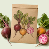 Kraft seed packet illustrated with Gourmet Beet Blend, with fresh Gourmet Beet Blend beside it