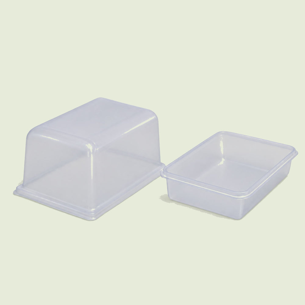 Humidity Domes And Bottom Trays on a soft green background