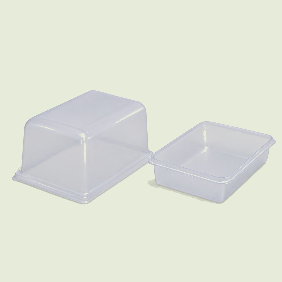 Humidity Domes And Bottom Trays on a soft green background
