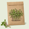 Kraft seed packet illustrated with Italian Amaro Chicory Microgreens, with fresh Italian Amaro Chicory Microgreens beside it