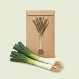 Kraft seed packet illustrated with King Richard Leek, with fresh King Richard Leek beside it