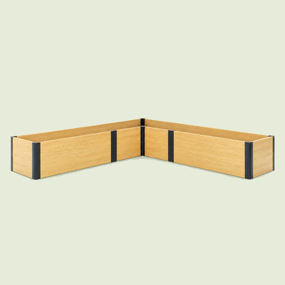 L-Shaped Woodgrain Raised Bed, 96 x 96 x 16 Inches on a soft green background