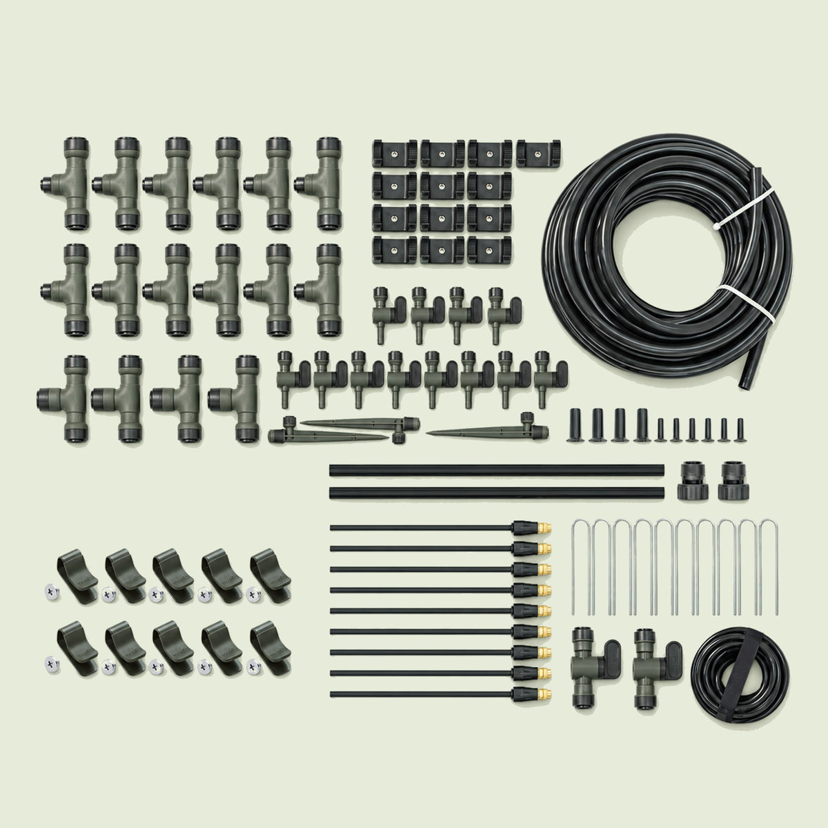 Large Irrigation Kit With Clamp Set on a soft green background