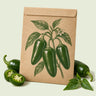 Kraft seed packet illustrated with Megatron Jalapeno Pepper, with fresh Megatron Jalapeno Pepper beside it