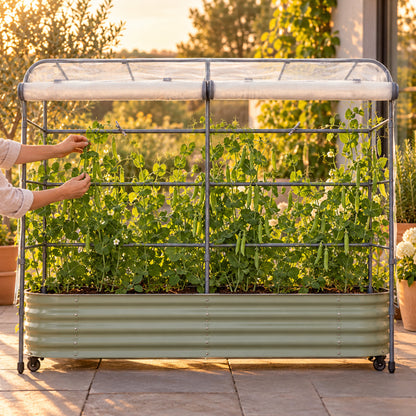 Mesh Cover and Trellis for Rolling Garden Bed in use in a home garden