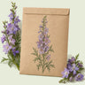 Kraft seed packet illustrated with Misty Lavender Larkspur, with fresh Misty Lavender Larkspur beside it