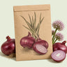 Kraft seed packet illustrated with Monastrell Red Onion, with fresh Monastrell Red Onion beside it