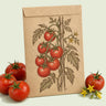 Kraft seed packet illustrated with Moneymaker Pole Tomato, with fresh Moneymaker Pole Tomato beside it