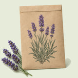 Kraft seed packet illustrated with Munstead Lavender, with fresh Munstead Lavender beside it