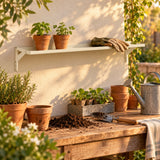 Potting Bench Bar Top Shelf in use in a home garden