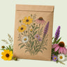 Kraft seed packet illustrated with Prairie Splendor Flower Mix, with fresh Prairie Splendor Flower Mix beside it