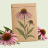 Kraft seed packet illustrated with Purple Coneflower, with fresh Purple Coneflower beside it