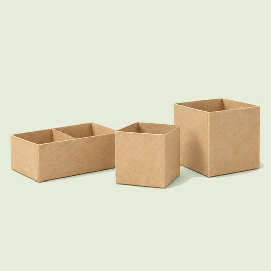 Recycled Paper Seedling Pots on a soft green background