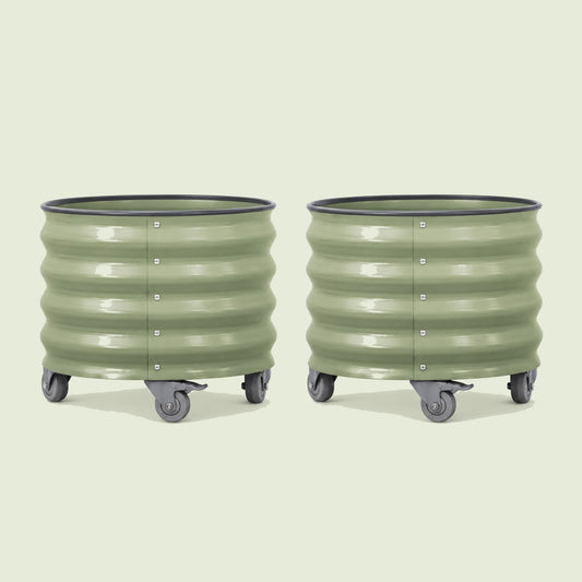 Rolling Citrus Planters, Two 20-Gallon Pots on a soft green background
