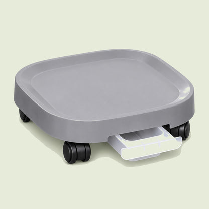 Rolling Plant Pot Base on a soft green background