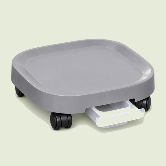 Rolling Plant Pot Base on a soft green background