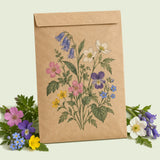 Kraft seed packet illustrated with Shade Flower Mix, with fresh Shade Flower Mix beside it