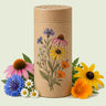 Kraft seed packet illustrated with Songbird Flower Mix Seed Shaker, with fresh Songbird Flower Mix Seed Shaker beside it