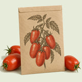 Kraft seed packet illustrated with Supremo Bush Roma Sauce Tomato, with fresh Supremo Bush Roma Sauce Tomato beside it