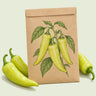 Kraft seed packet illustrated with Sweet Banana Pepper Heirloom, with fresh Sweet Banana Pepper Heirloom beside it
