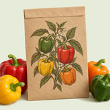 Kraft seed packet illustrated with Sweet Bell Pepper Blend, with fresh Sweet Bell Pepper Blend beside it