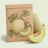 Kraft seed packet illustrated with Sweet Delight Honeydew Garden Melon, with fresh Sweet Delight Honeydew Garden Melon beside it